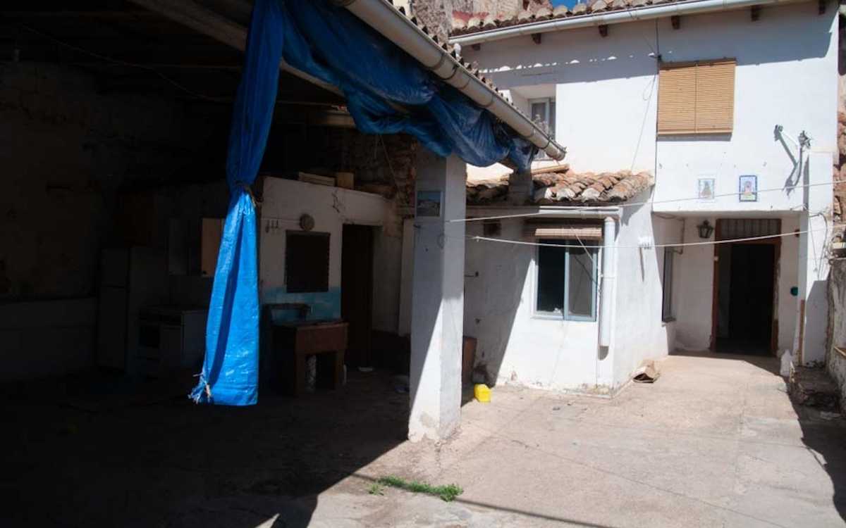 Village house with patio, in good condition.