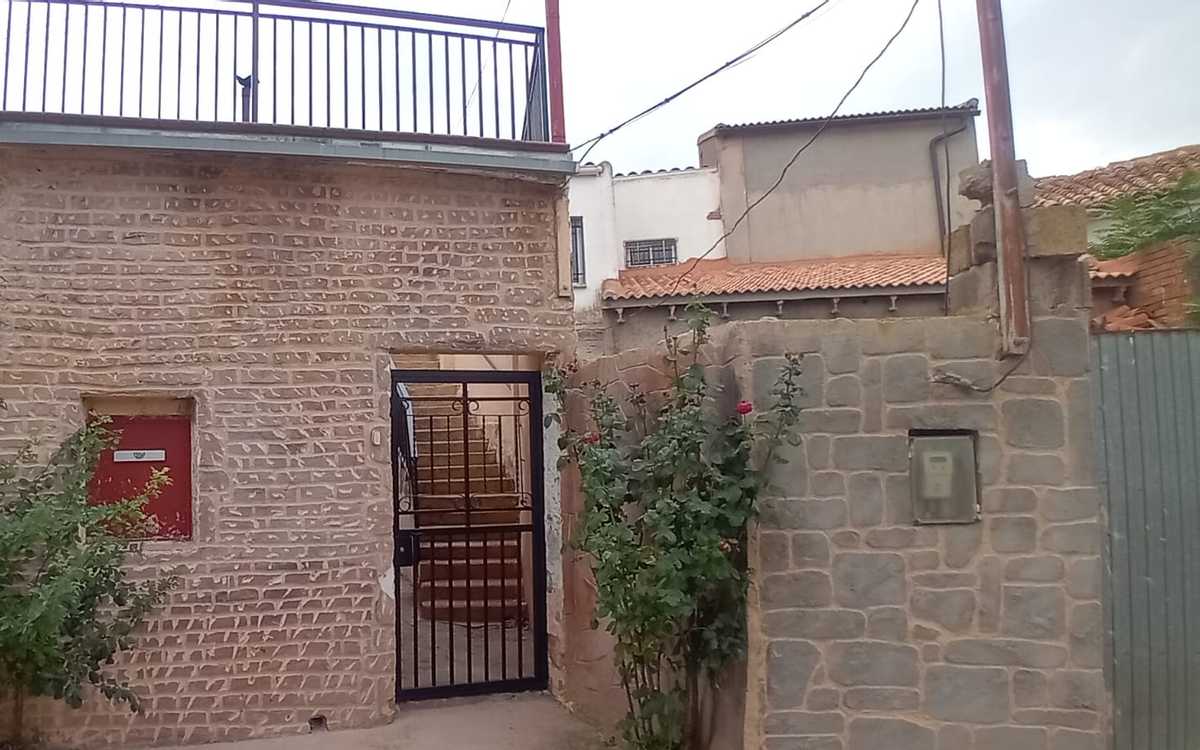 property comprising house and outbuildings